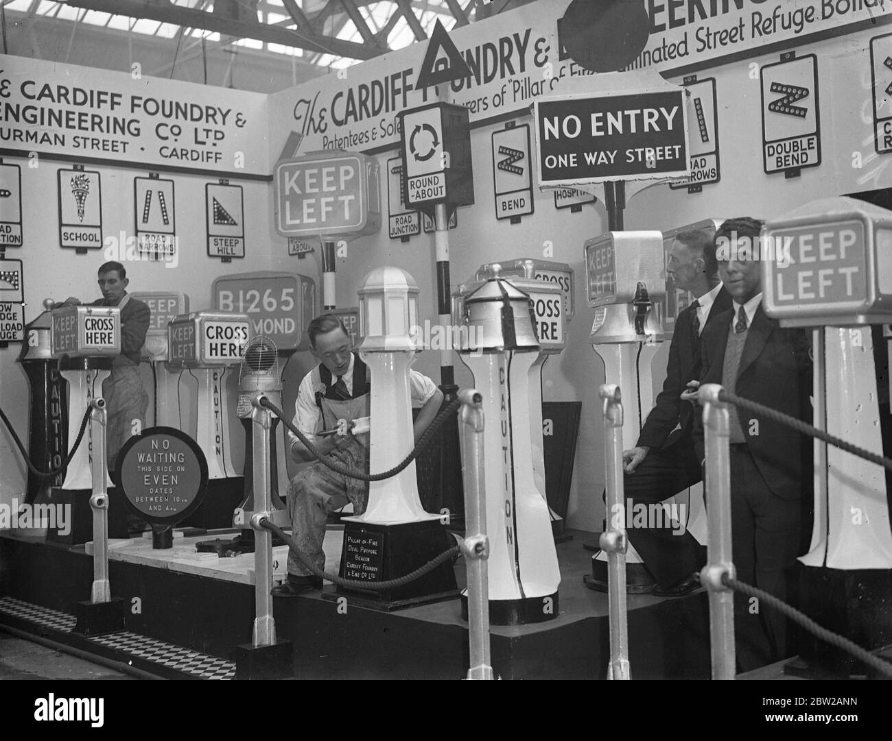 'Dizzy' time for motorist at public works exhibition. The Public Works and transport exhibition has opened at the Royal agricultural Hall, Islington. The exhibits include the latest traffic signs, pneumatic drills and road engineering machinery. 15 November 1937 Stock Photo