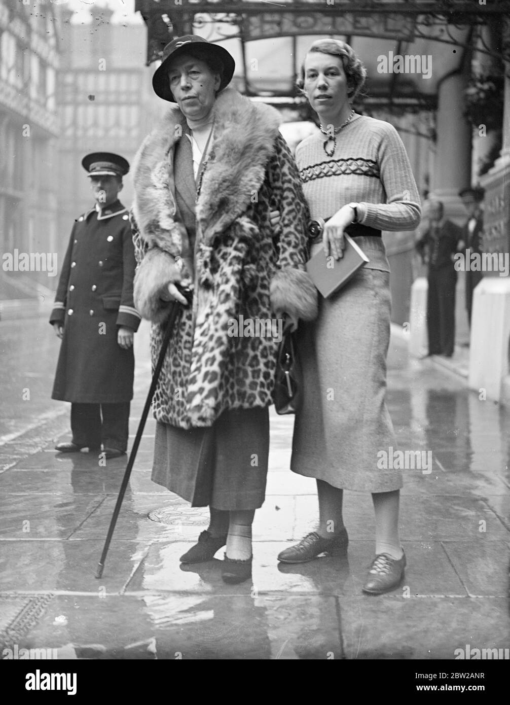 Wife of retiring Danish Minister, helped by daughters as she leaves London. Owing to an operation on her foot, Countess Ahlefeldt Laurvig, wife of the the stiring Danish Minister, left London by car for Southampton to embark on the 'Edinburgh Castle''. The Countess was unable to be present at the farewell party given by the departing Danish Minister, and her daughter, Countess Ingegerd Ahlefeldt, who is staying on in London, acted as hostess for her father. 2 December 1937 Stock Photo