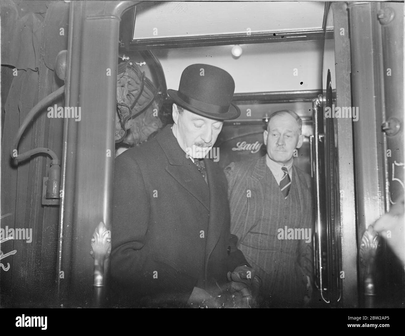 Air Chief leaves to inspect Empire bases-Hong Kong included. As Britain's note on Hong Kong was presented to Japan, Sir Edward I Ellington, Marshal of the Royal Air Force, left Victoria station, London, on a tour of inspection of the RAF stations in the Near and Far East. Sir Edward, who is Inspector General of the RAF, is accompanied by Squadron leader R R Nash, personal assistant. Photo shows, Sir Edward Ellington (right) with Air Chief Marshal Sir Cyril Newell., Chief of Air Staff, who saw him off at Victoria. 23 December 1937 Stock Photo