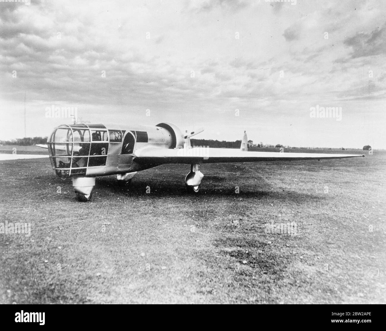 Plane with a glass nose for mapmakers. Designed for the use of aerial mappers, an unusual, glass nosed aeroplane has been undergoing tests at Marshall, Michigan. The machine eliminated many of the limitations which have confronted flying surveyors in ordinary planes. Constructed on plans drawn up by Talbert Abrams, an aerial survey company official, the plane affords unobstructed forward and downward vision for pilot and photographers, stability and long cruising radius. The motor is in the rear of the cockpit and is fitted with a pusher propeller. 8 December 1937 Stock Photo
