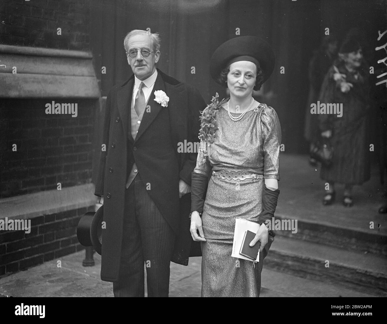 Baronet of 65, married for the third time in London. Maj Sir Henry Spencer Moreton Havelock Allen, aged 65, was married to Miss Doris Pamela Lavy at St Paul's church, Knightsbridge.. Photo shows, the bride and bridegroom leaving the church after the ceremony 7 December 1937 Stock Photo