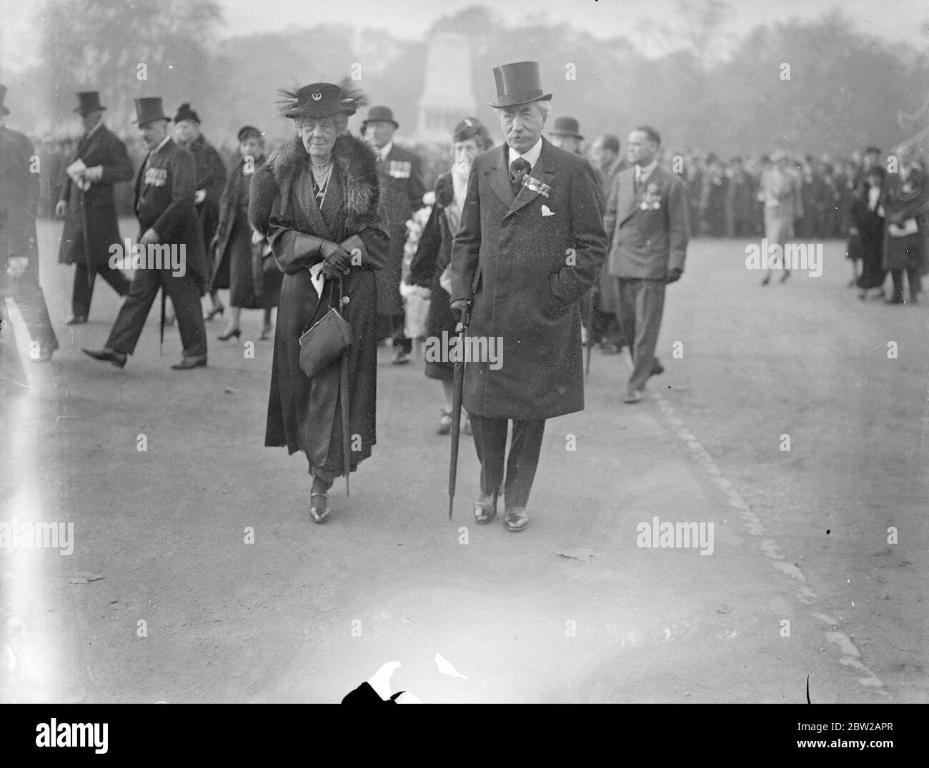 Lady Plumer and Belgian ambassador at Ypres commemoration parade in London. Lady Plumer, wife of Field Marshal Lord Plumer, laid the Ypres Leagues wreath on the Cenotaph, after the 17th anniversary commemoration parade of the Ypres League on Horse Guards Parade. She deputised for Princess Beatrice. Photo shows, Lady Plumer walking to the Cenotaph with the Belgian ambassador, Baron de Cartier de Marchienne. 31 October 1937 Stock Photo