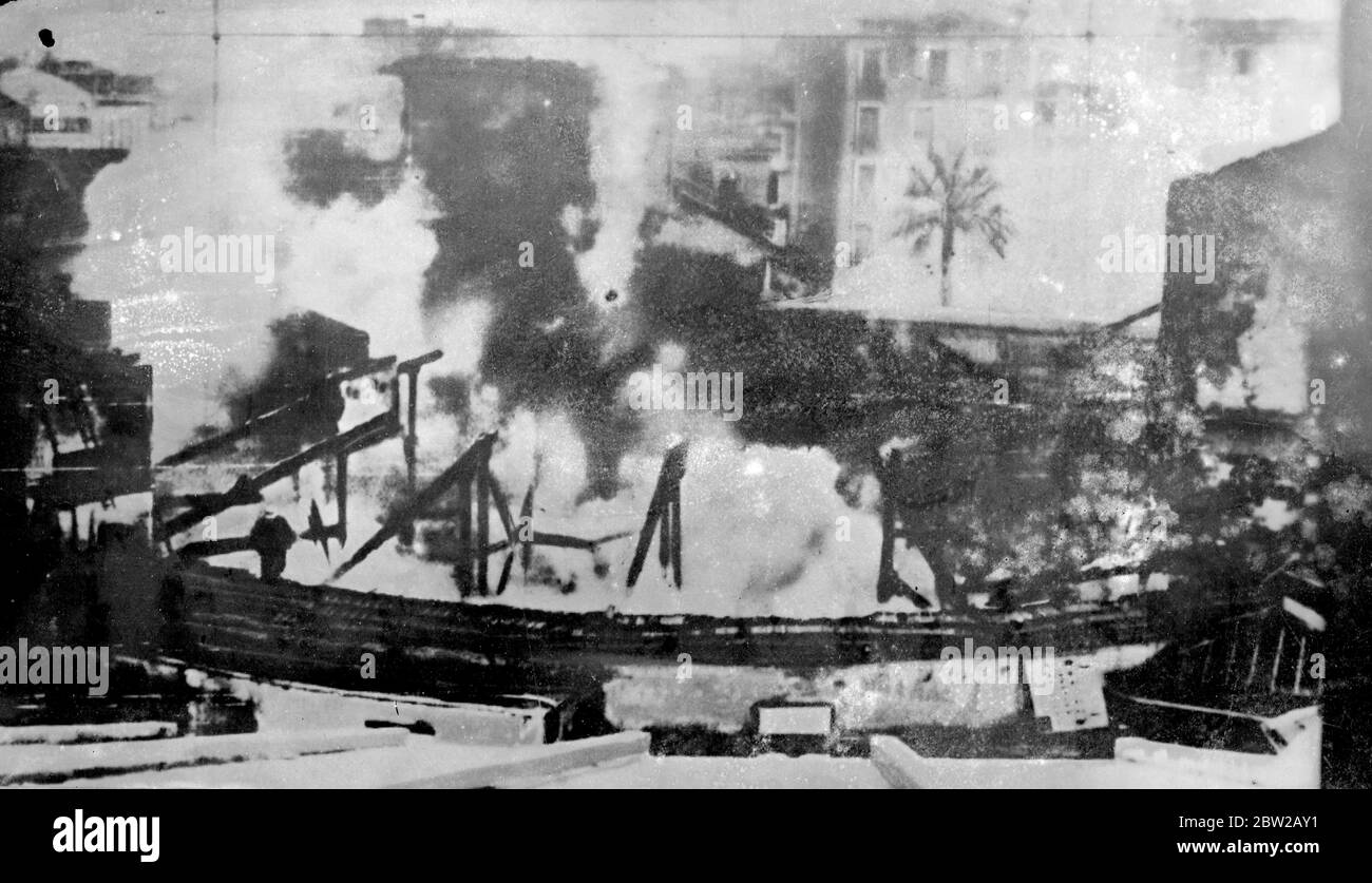 The Â£500,000 Eldorado Casino at Nice has been destroyed by a fire which broke out in the main hall in the early morning. Firemen flunk children, aged men and women from bedroom windows nearby. One man is reported to have lost his life and several people injured. Only a shell of the palatial casino building which a few hours before had been the scene of a brilliant gala, is now left standing. 6 March 1936 Stock Photo