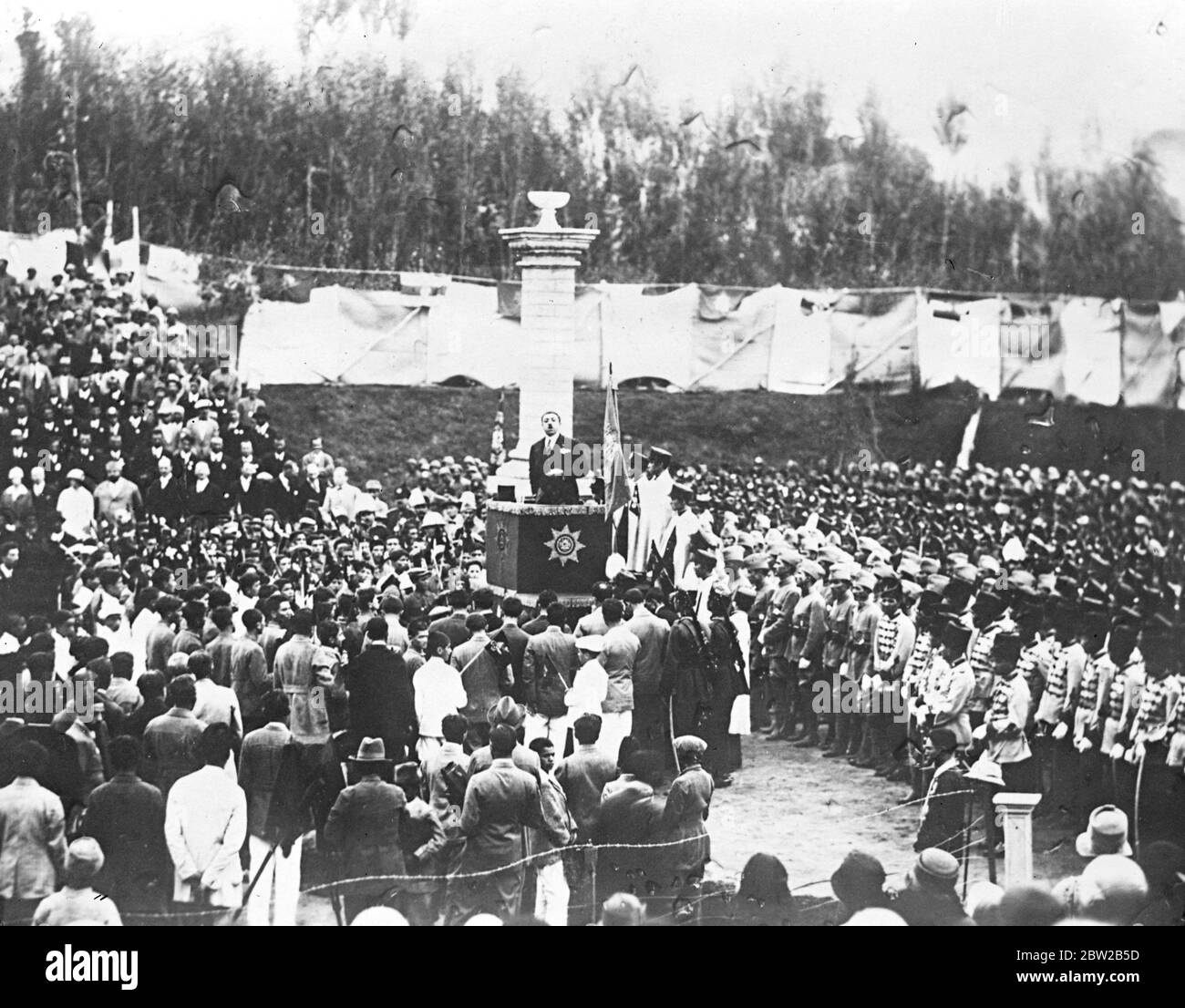 King of Afghanistan addresses his subjects. King Amanullah speaking at the opening of the Amonic Garden. Note the European costume worn by the mullahs. 27 October 1928 Stock Photo