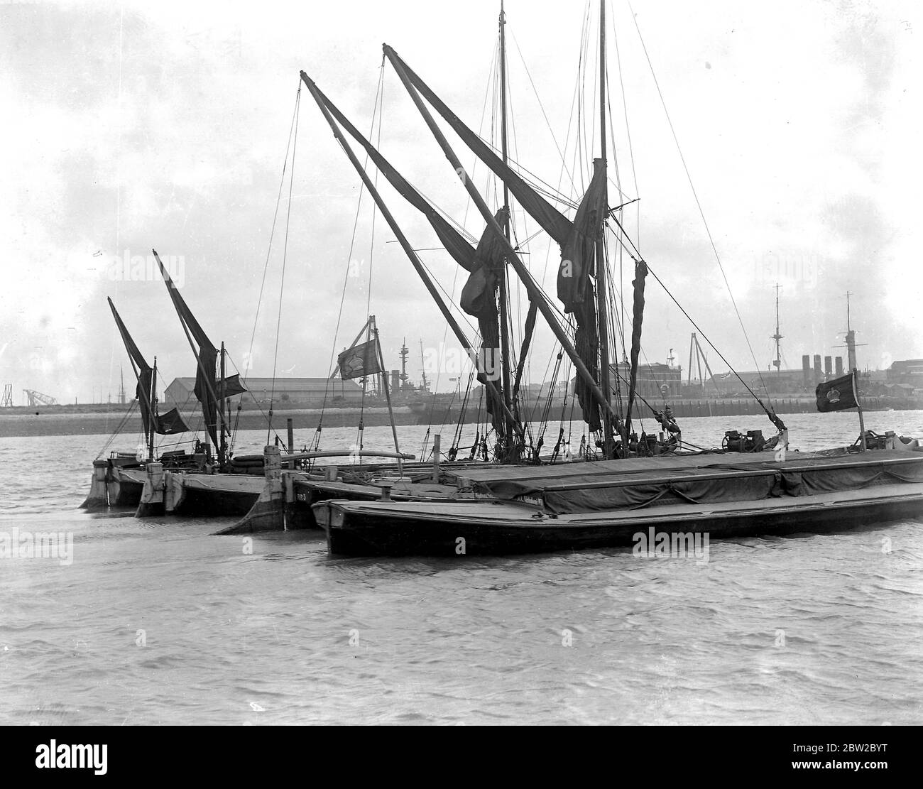 England's mobilisation for the war. Sailing barges in the Thames. 1914 Stock Photo