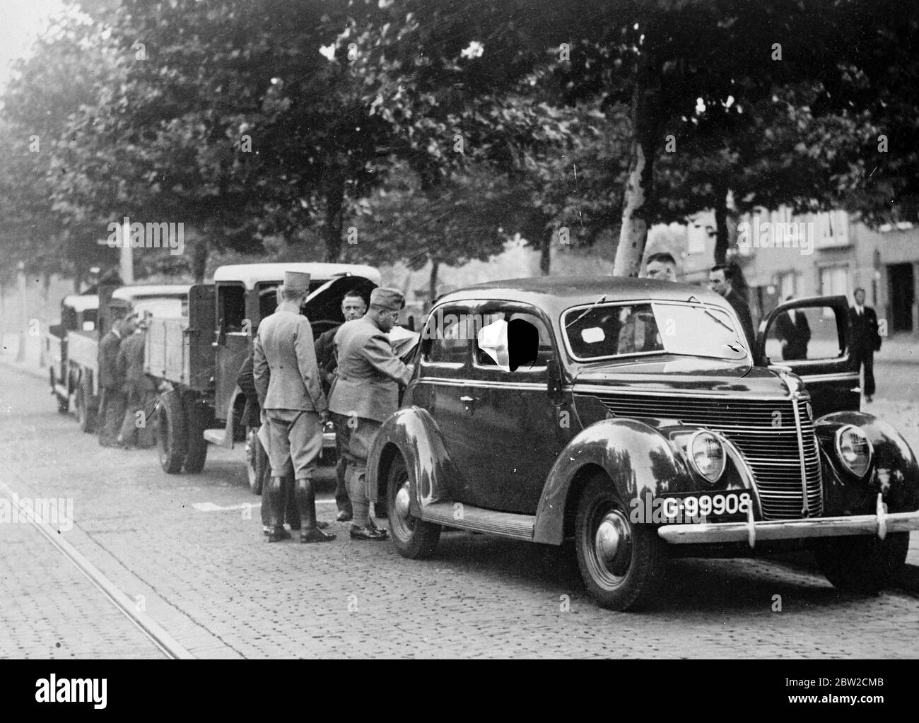 Mobilisation in Holland, undertaken owing to the crisis, has been completed and all frontier posts and roads are fully guarded. Motor vehicles requisitioned for the army lined up in Amsterdam. 30 August 1939 Stock Photo