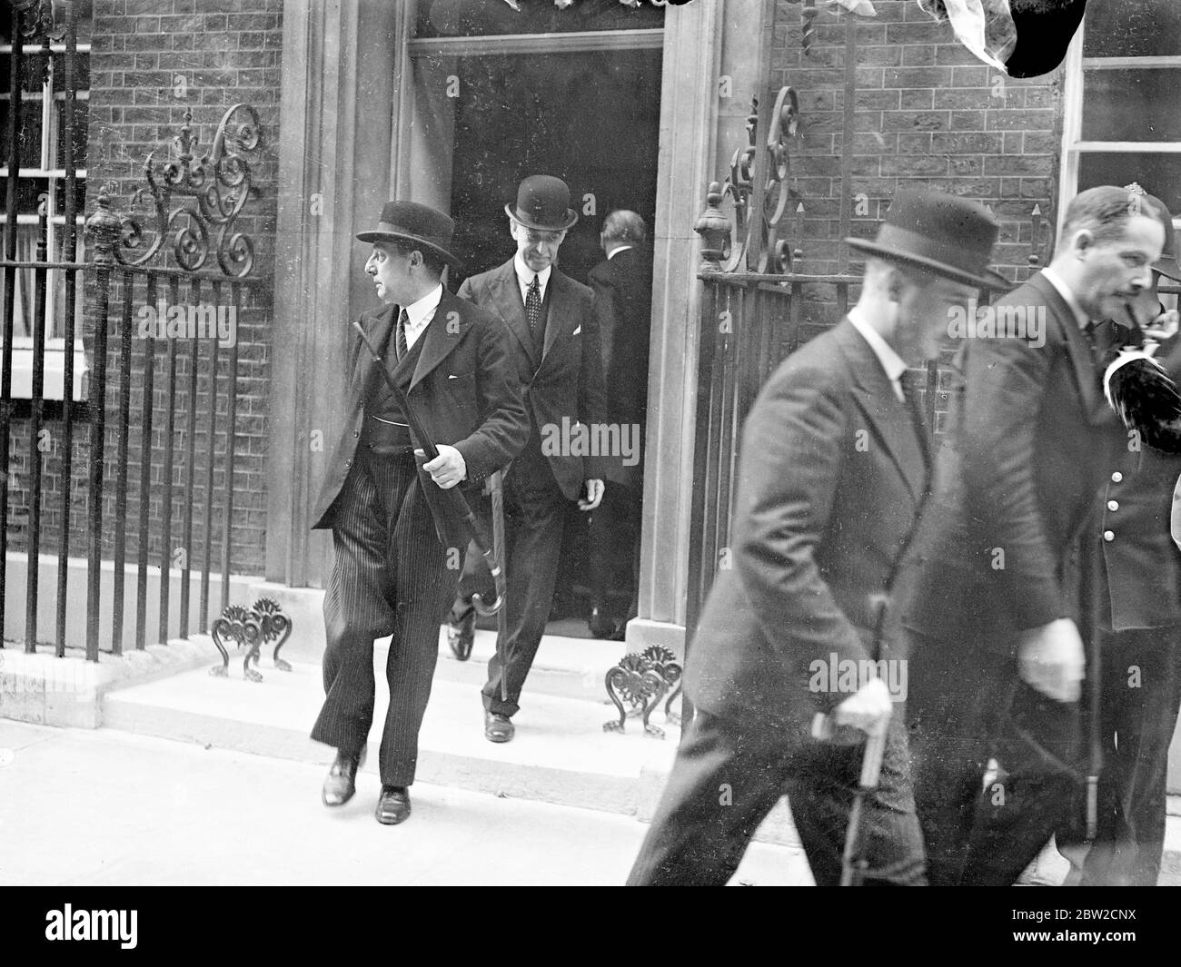 Dr Lesley Burgin, the Minister of Supply, followed by Lord Stanhope, First Lord of the Admiralty, as they left No 10, Downing Street this afternoon (Saturday). 2 September 1939 Stock Photo
