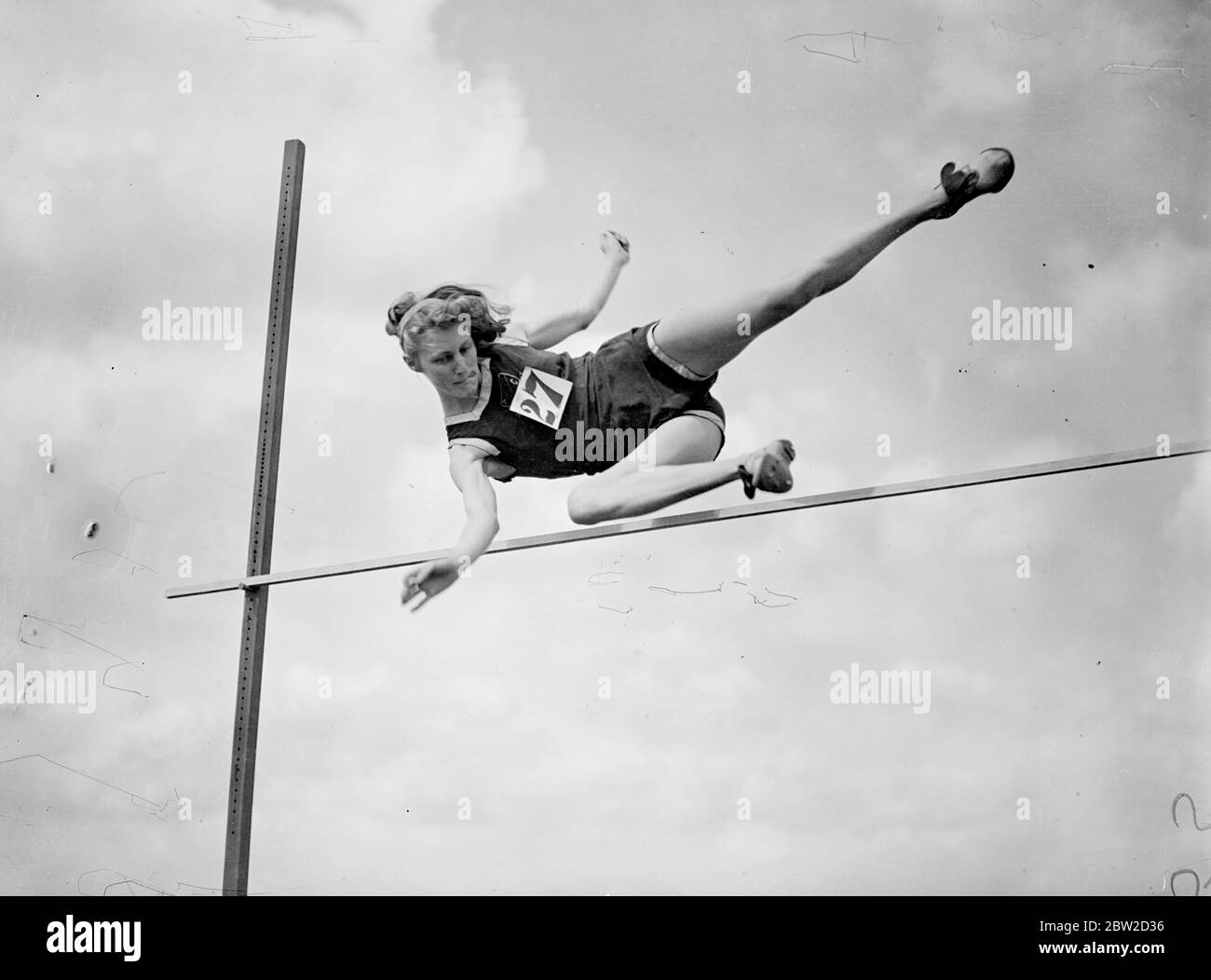 The Civil Service Sports Took Place at the Civil Service Sports Ground at Chiswick, London. Photo Shows: Miss Dorothy Odam, world record high jumper with 5 feet 5 inches competing in the high jump. 19 June 1939 Stock Photo