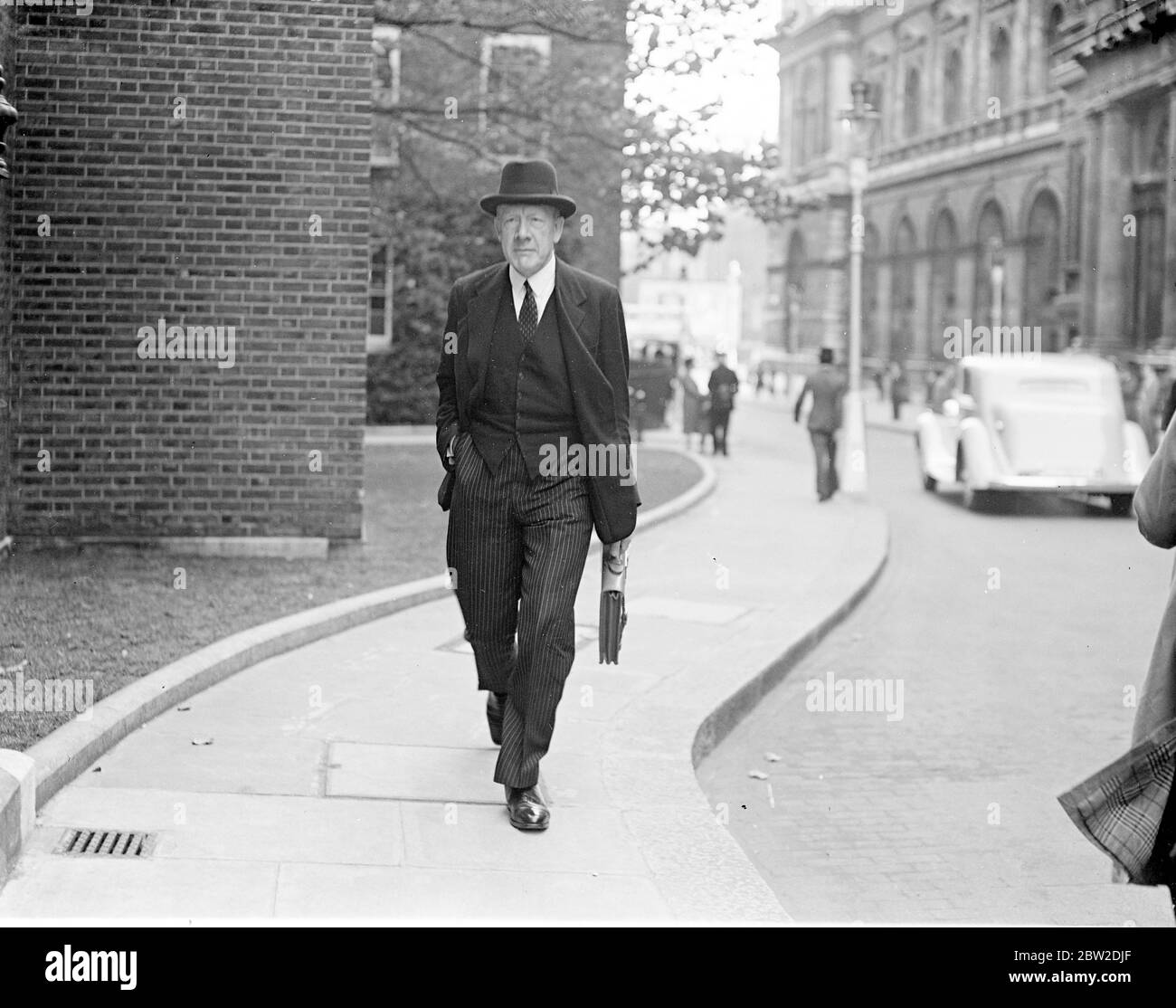 Mr Walter Elliot, the Cabinet Minister of Health, returning from an important meeting regarding the Arab rebellion in Palestine. 19 October 1938 Stock Photo