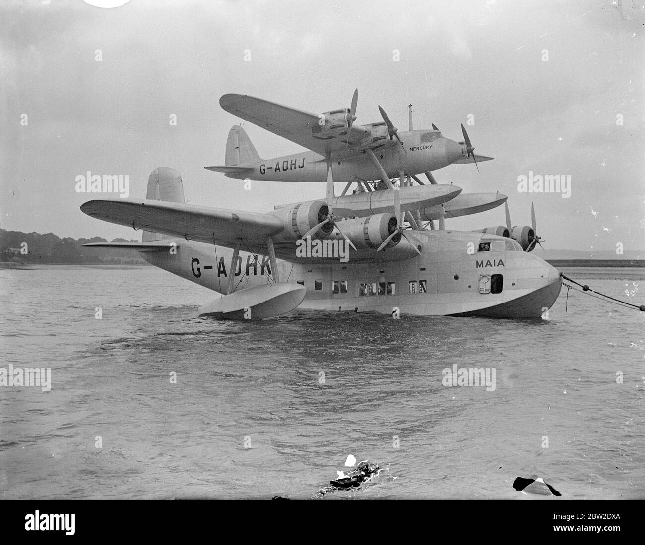 The Short - Mayo Composite , a piggy-back long-range seaplane/flying boat combination , produced by Short Brothers at their works at Rochester, Kent. The smaller aircarft - the Mercury - is placed on top of the Maia flying boat. The plane is expected to bring India and New York within days of no-stop flight . 12 October 1937. Stock Photo