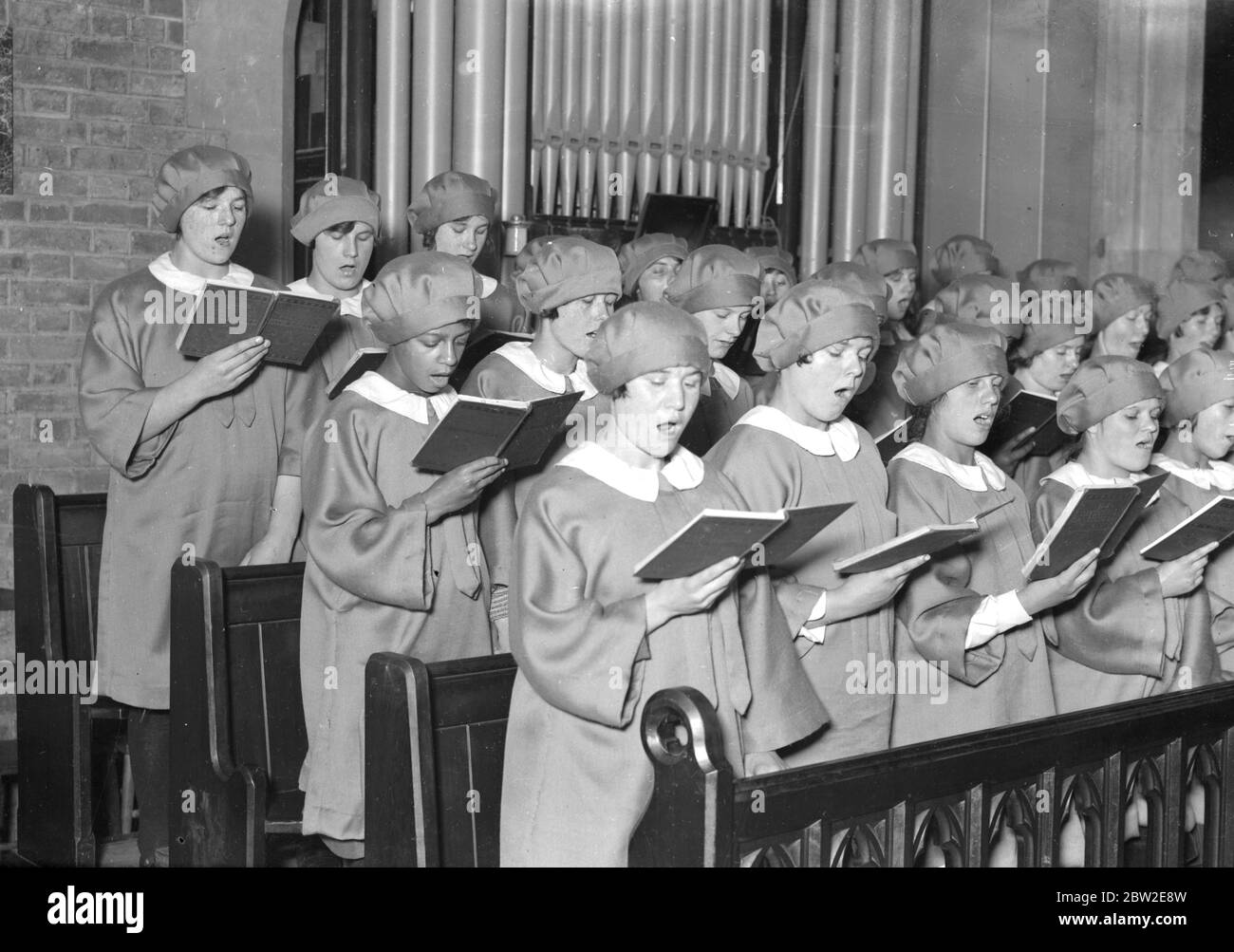 Girl choristers at Dr Barnardo's homes, Berkingside, practising