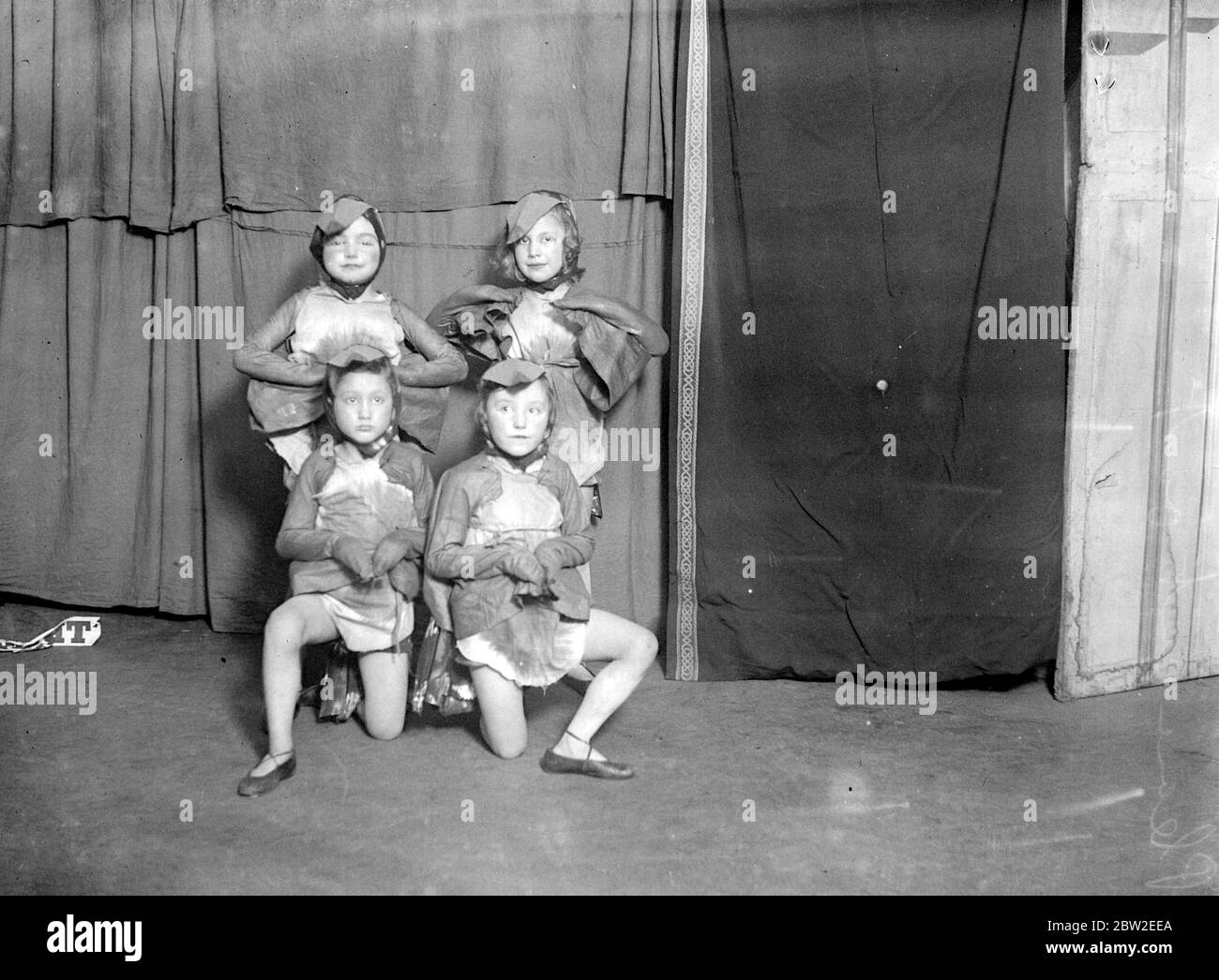 Girls dancing in costume on the stage. 1933 Stock Photo Alamy