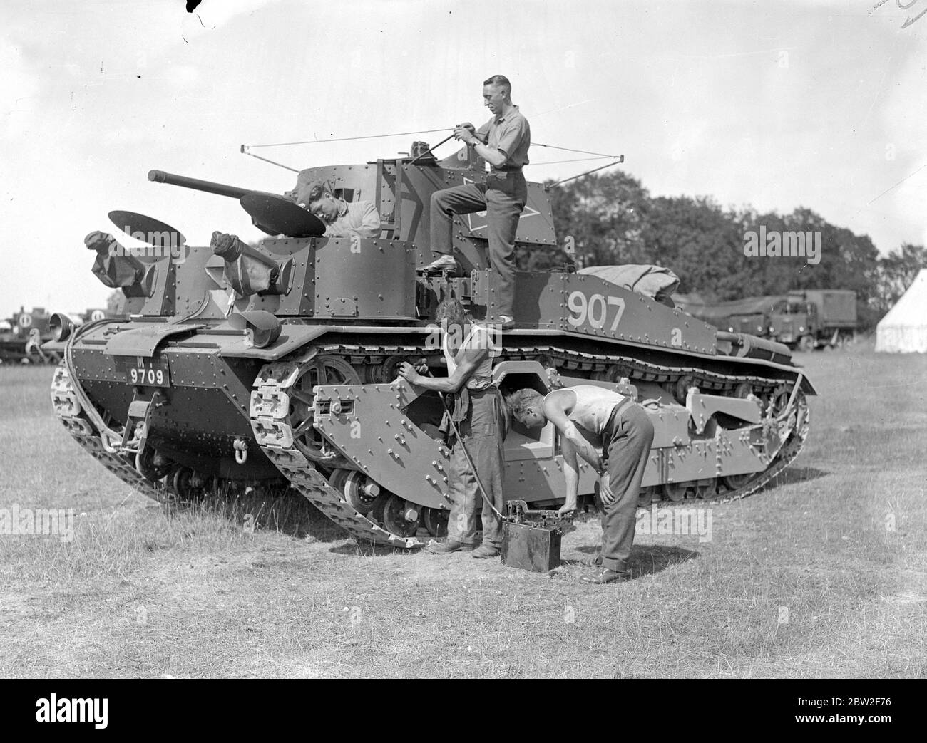 A Vickers Medium Mk III of the 1st Tank Brigade, on Salisbury Plain, in the middle of being serviced. 20 August 1935 Stock Photo