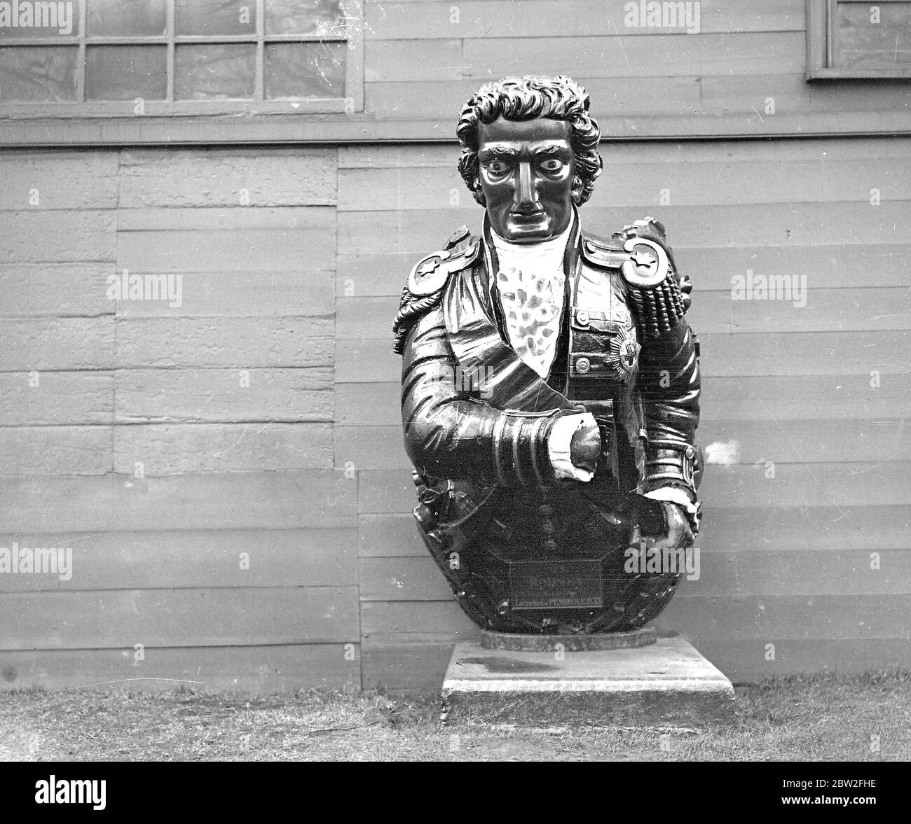 Figure Head in uniform from H.M.S Rodney. Seven feet foot and three inches (7' 3). Launched at Pembroke in 1833. The figure was removed because it was repeatedly damaged at sea. The missing hand was carried away by a heavy sea. Photographed at Admiral's Walk, Chatham, Kent. Stock Photo