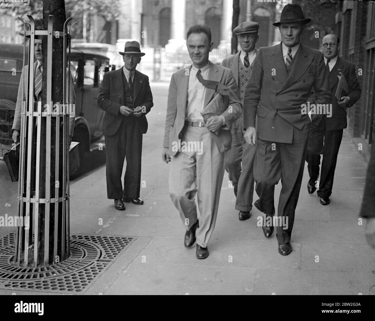 London Bus Strike Sequel. A.F. Papworth (tie flying) and Bill Ware arriving at transport House to appear before the National Executive of the Transport Workers Union to answer charges brought against them of having associated with an unofficial movement within the Union. Dismissed from the Union 13 July 1937. 22 June 1937 Stock Photo