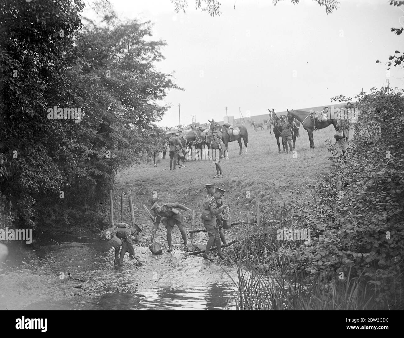 Royal Army Route March . Watering the horses. 1934 Stock Photo