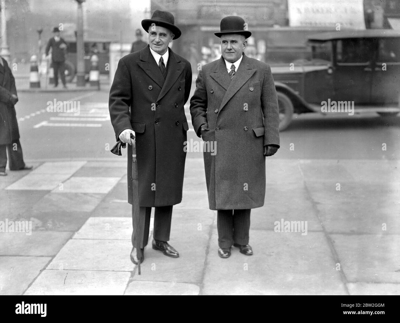 Westminster - Arrival of members and Election of Leader of the Labour Party. Mr Munroe (left-) and Mr G. Rowlands. Stock Photo