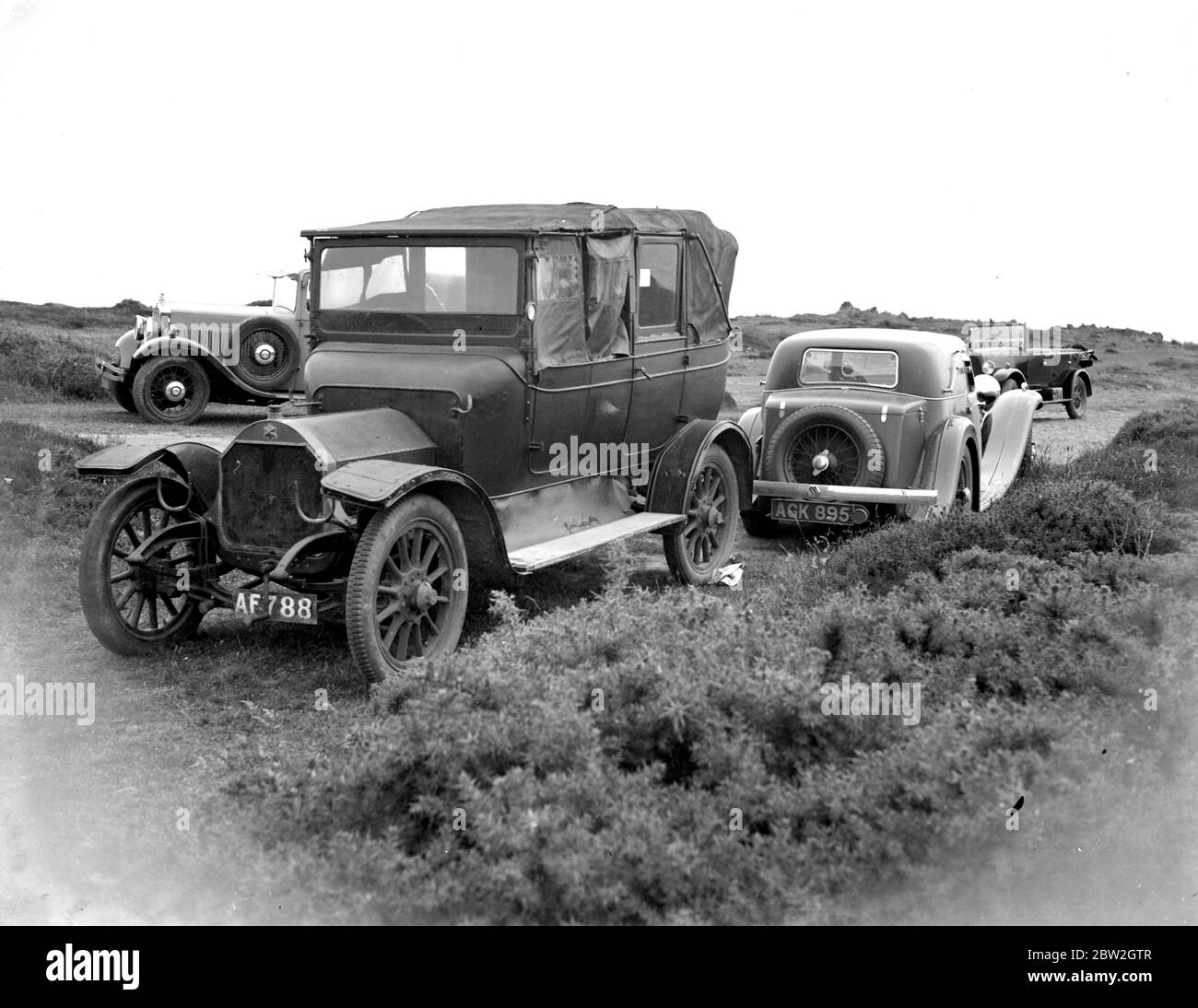 Old car at Kynance Cove, Cornwall. 1933 Stock Photo