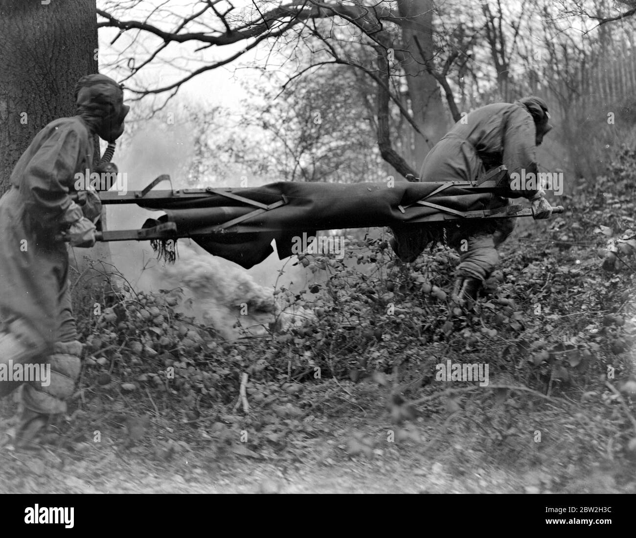 Gas Attack by Air. The famous Chislehurst Caves formed the scene of action for a trial by the Kent Voluntary Aid Detachment. British Red Cross of up to-date precautions in the event of gas attack from the air. 9 April 1935 Stock Photo