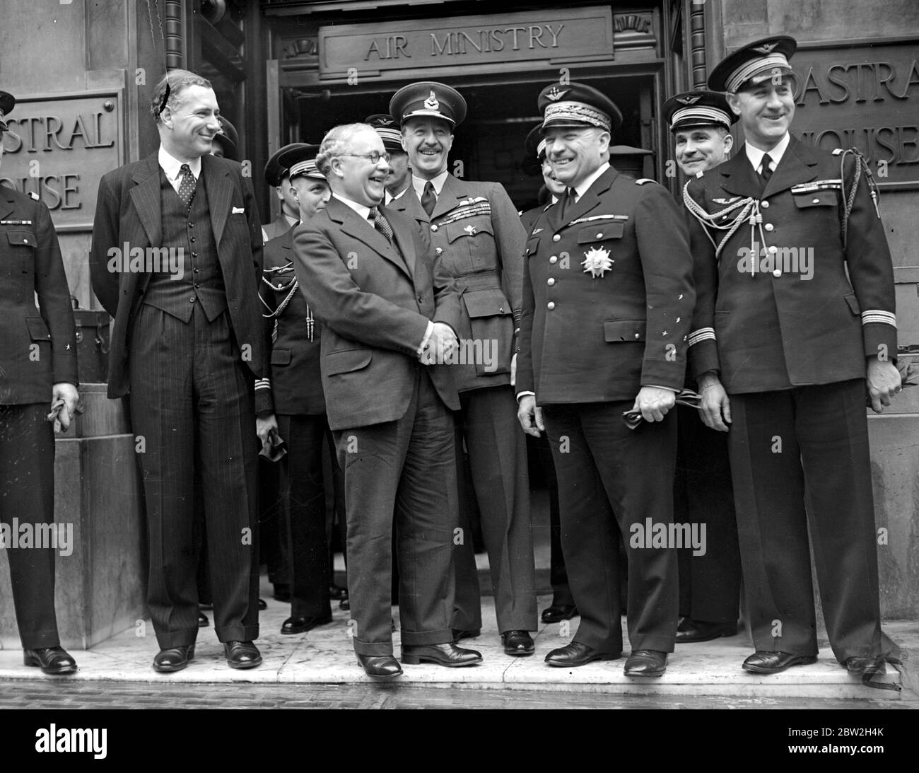 French air mission at the Air Ministry, Kingsway. Sir Kingsley Wood, in happy mood with General Vuillemin (Chief Gen Staff French Air Force). In the centre, Air Marshall Sir Cyril Newall. 30 May 1938 Stock Photo