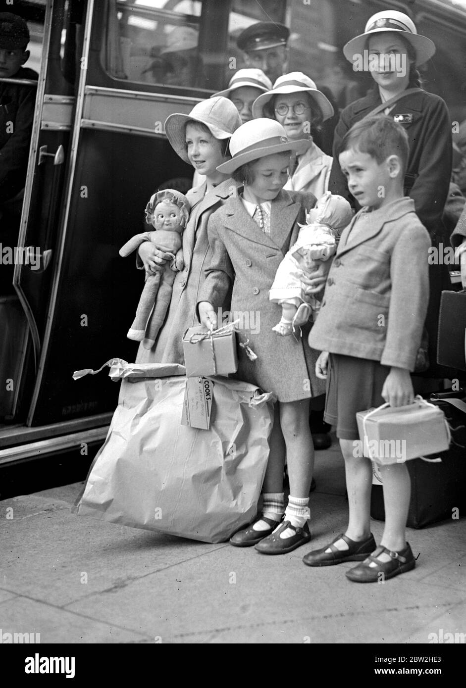 War Crisis, 1939. Air Raid precautions Second World War began, and evacuees, like these in this picture, began to pour out of London for safety of the countryside. Carrying gas-mask cases, lugage labels identifying them, fixed to their clothing, it was for some of them a Great Adventure, for many of them had never left home, or even London before. 3 September 1939 Stock Photo