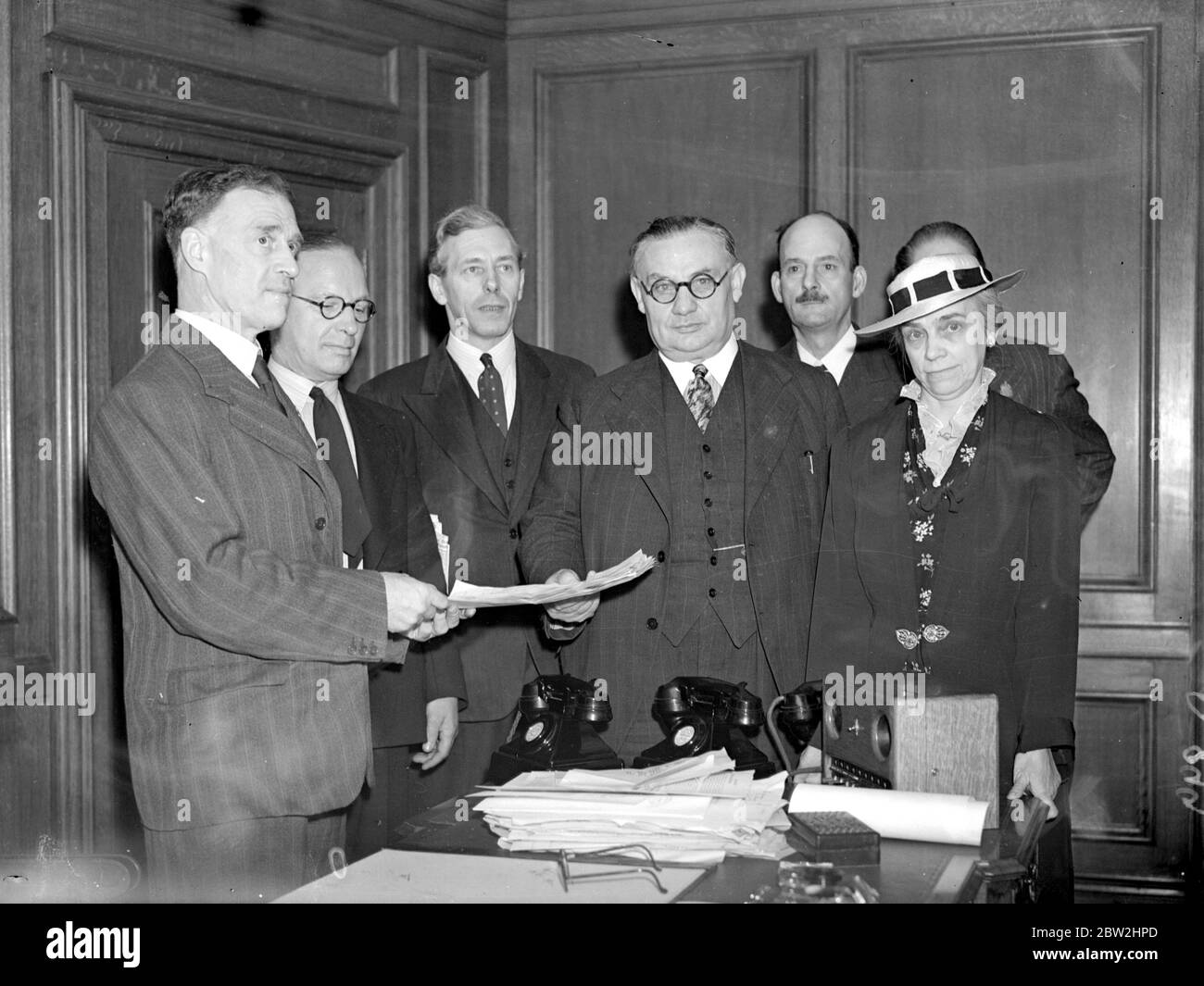 Wandsworth By - Election. Mr Ernest Bevin, Minister of Labour, hands in his nomination papers to Councilor W.J. Bonney, J.P. as the unofficial socialist candidate (Unaproved) in the by-election caused by the elevation of Colonel Nathan to the peerage. 22 June 1940 Stock Photo