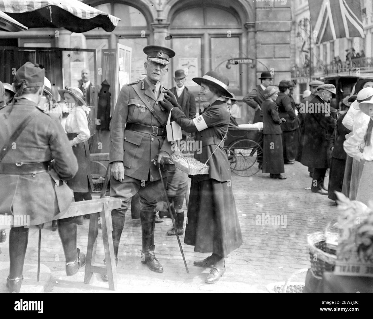 St George's Day at Windsor. General Caterick Carey, acting Governor of Windsor Castle, being decorated with a flag. 21 April 1917 Stock Photo