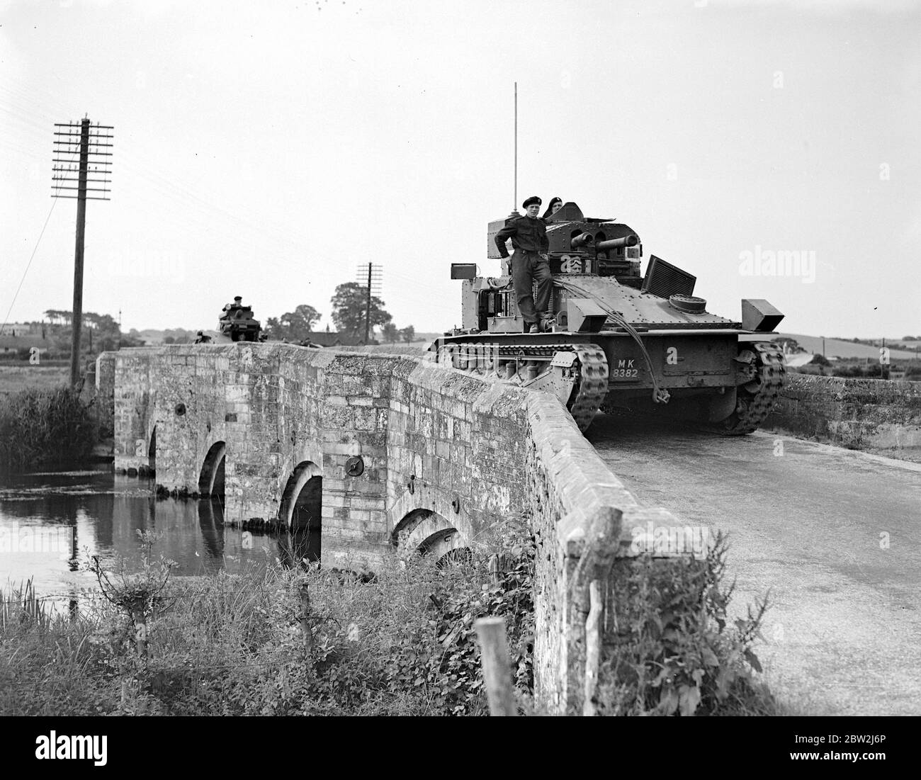 A Vickers Medium Mk II of the 1st Tank Brigade ccrossing a bridge, near Salisbury Plain. 20 August 1935 Stock Photo