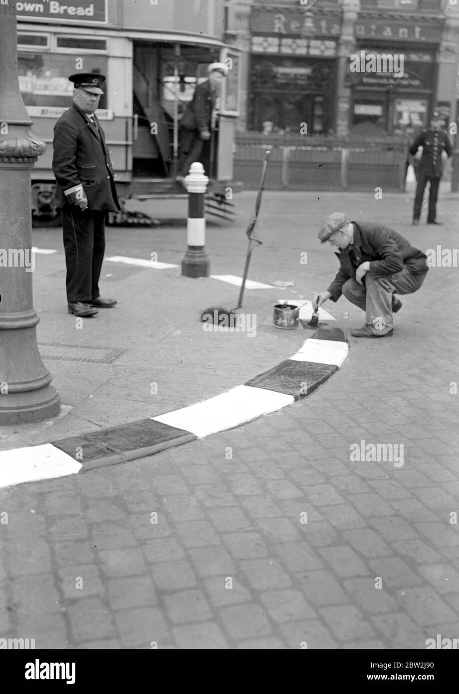 Air Raid precautions Black-out preparations black and white kerbs at the Elephant. 28 July 1939 Stock Photo