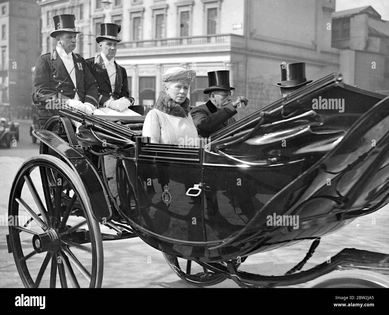 The King and Queen on their way to open the New Wing of The National Portrait Gallery. 30 March 1933. George V (George Frederick Ernest Albert) British ruler; king of Britain 1910-1936 (1st ruler of House of Windsor); emperor of India 1910-1936; son of Edward VII  1865-1936 Stock Photo
