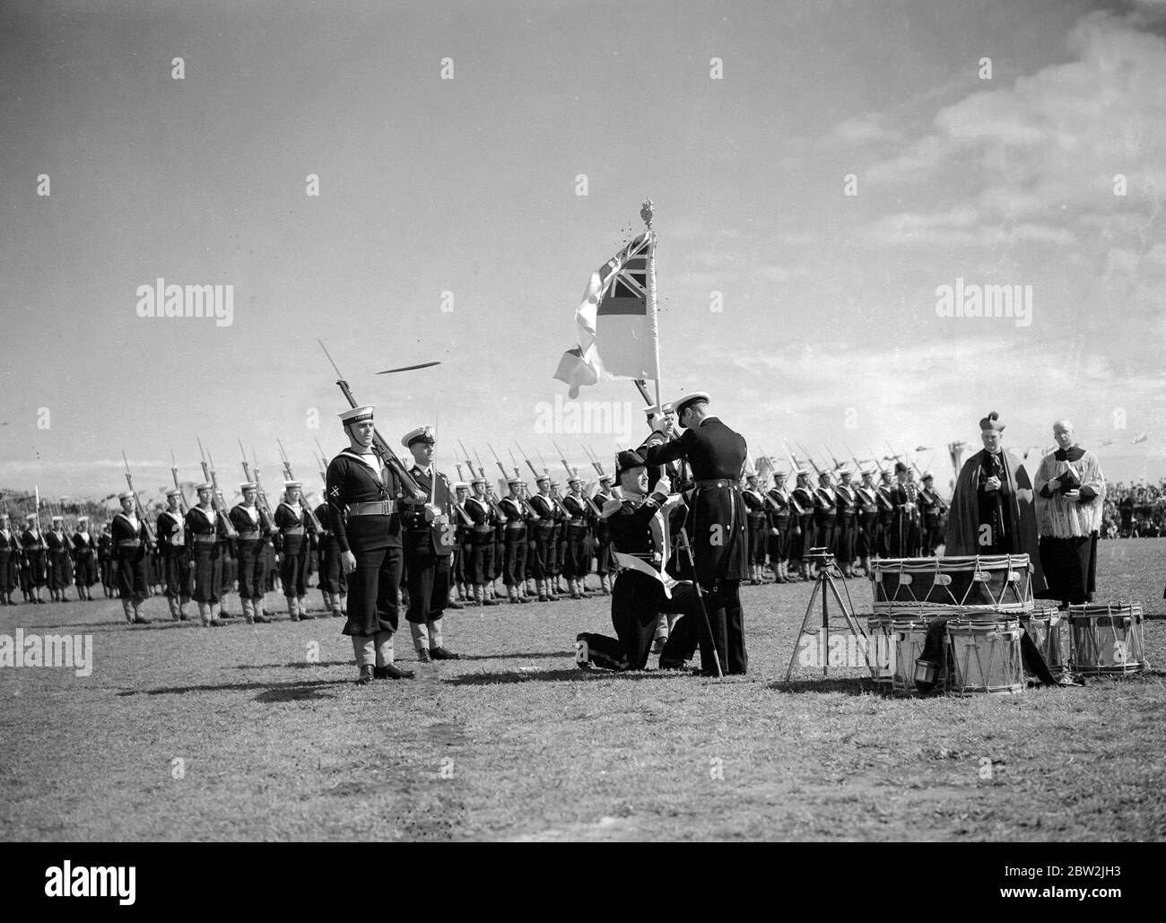 The royal tour of Canada and the USA by King George VI and Queen Elizabeth , 1939 . The King presents the King 's Colour to the Western Command of the Royal Canadian Navy at Beacon Hill Park , Victoria . Stock Photo