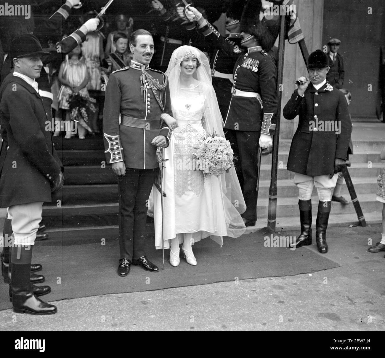Wedding of Sir Alexander Stanier, Welsh Guards and Miss Dorothy Miller (daughter of Gen and Mrs Miller, Shotover Park) at the Guards Chapel, Wellington Barracks, London. J. Wardle (Huntsman of S. Oxforshire Hunt, Right Adams) 21 July 1927 Stock Photo