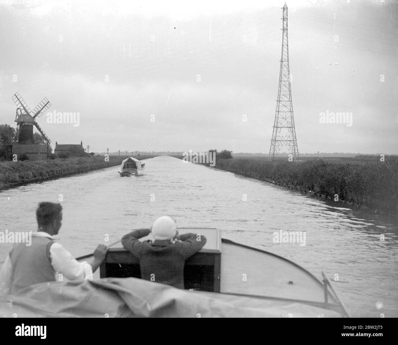 Pylon seen from a boat sailing the The Broads in Norfolk. 1934 Stock Photo