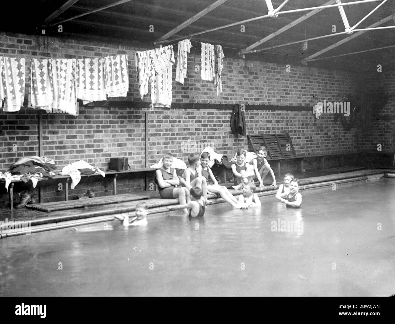 Boys swimming in the local baths. 1933 Stock Photo Alamy
