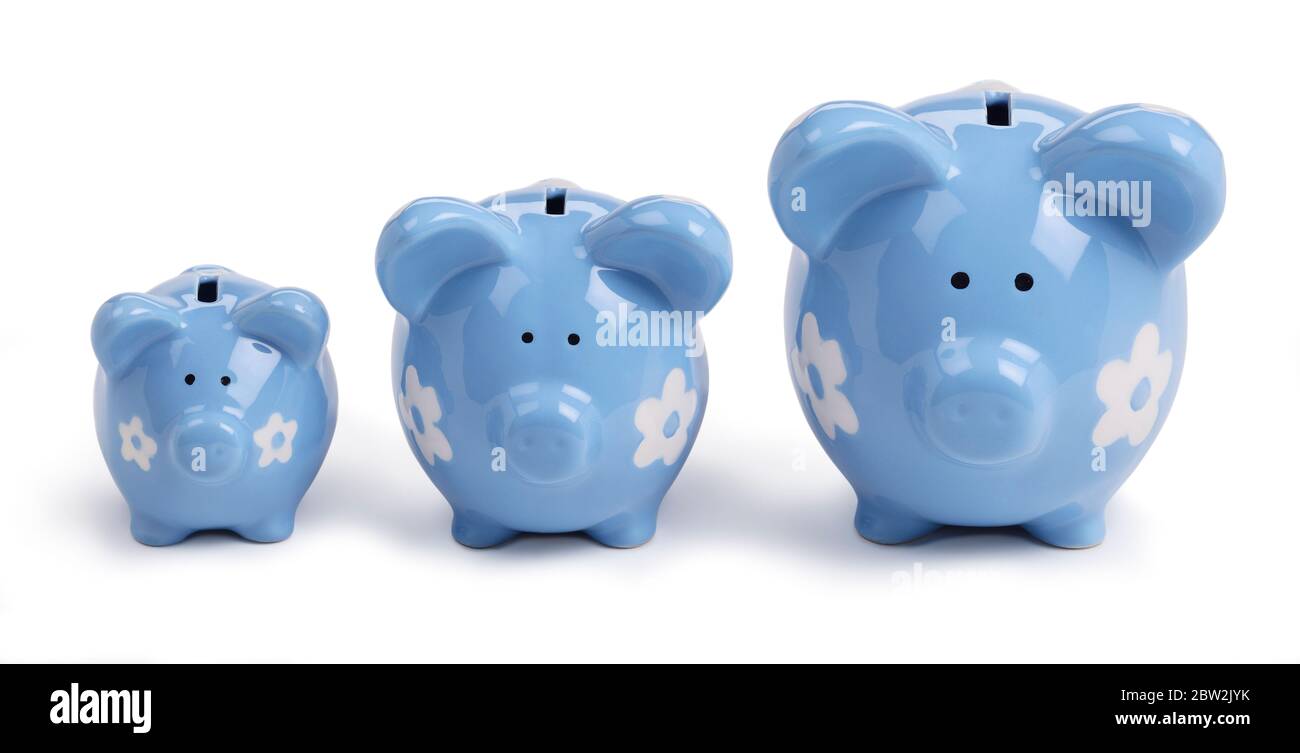 Small medium and large piggy banks Stock Photo