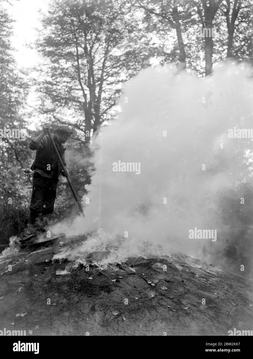 Charcoal burning for the trenches in the New Forest. . Stock Photo