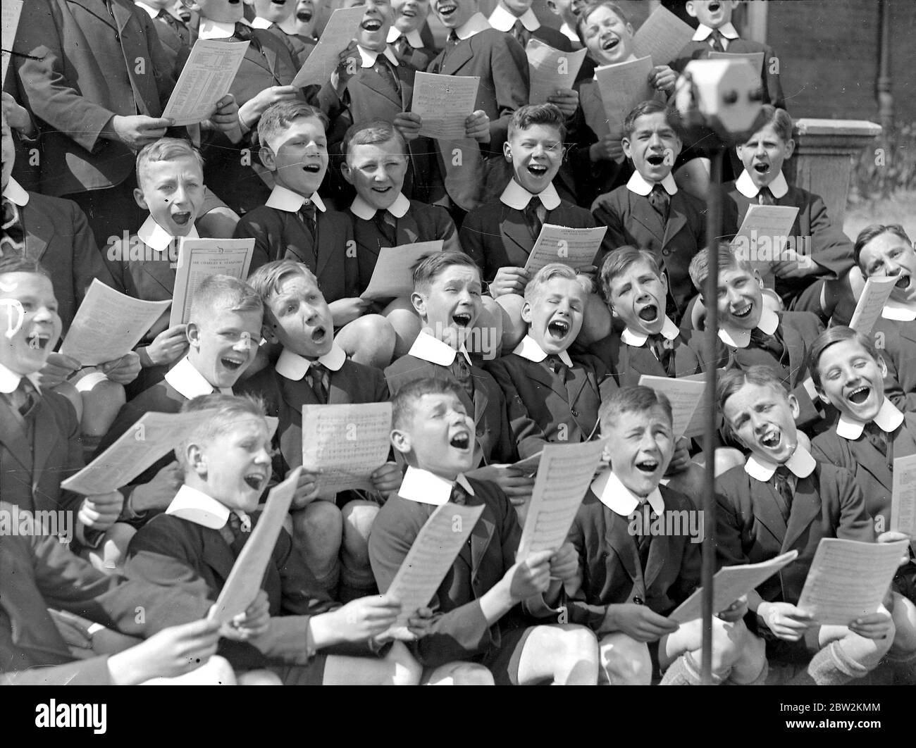 Boys, Fortescue House School, Twickenham. Rehearsing Broadcast singing 15 May 1934 Stock Photo