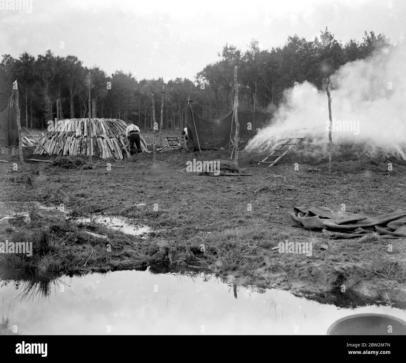 Charcoal burning for the trenches in the New Forest. Stock Photo
