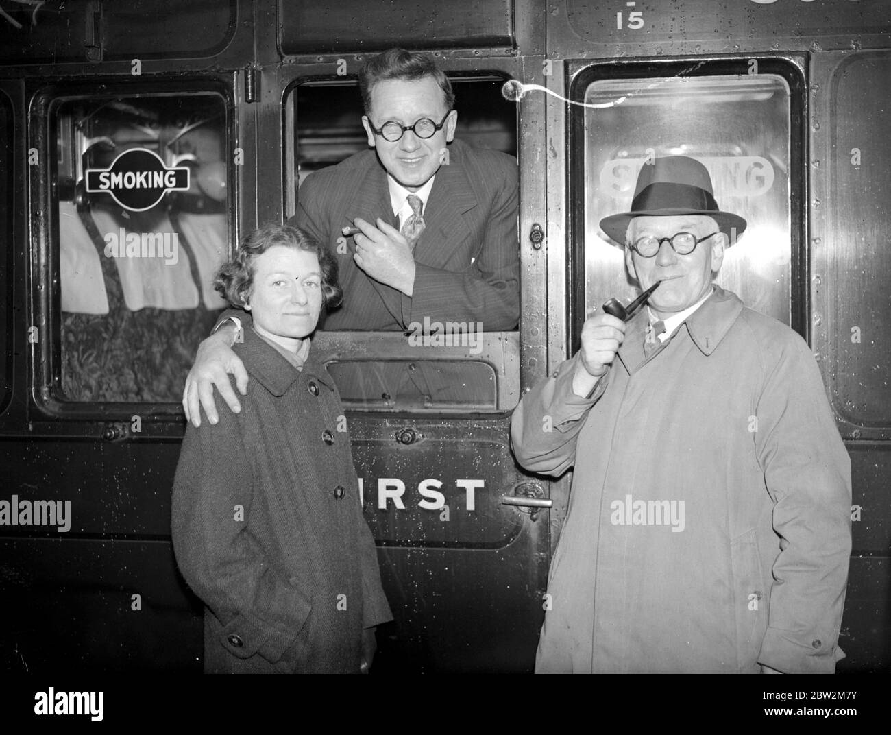 At Waterloo. Mr Herbert Morrison on his departure for USA Mrs Morrison and Mr Harold Clay (Chairman London Labour Party) Bid him farewell. 25 March 1938 Stock Photo