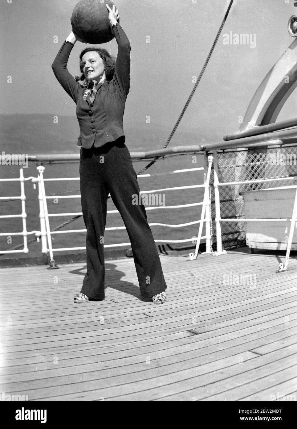King George VI and Queen Elizabeth on Canada tour 1939 - Photo shows woman on deck doing keep fit with a ball Stock Photo