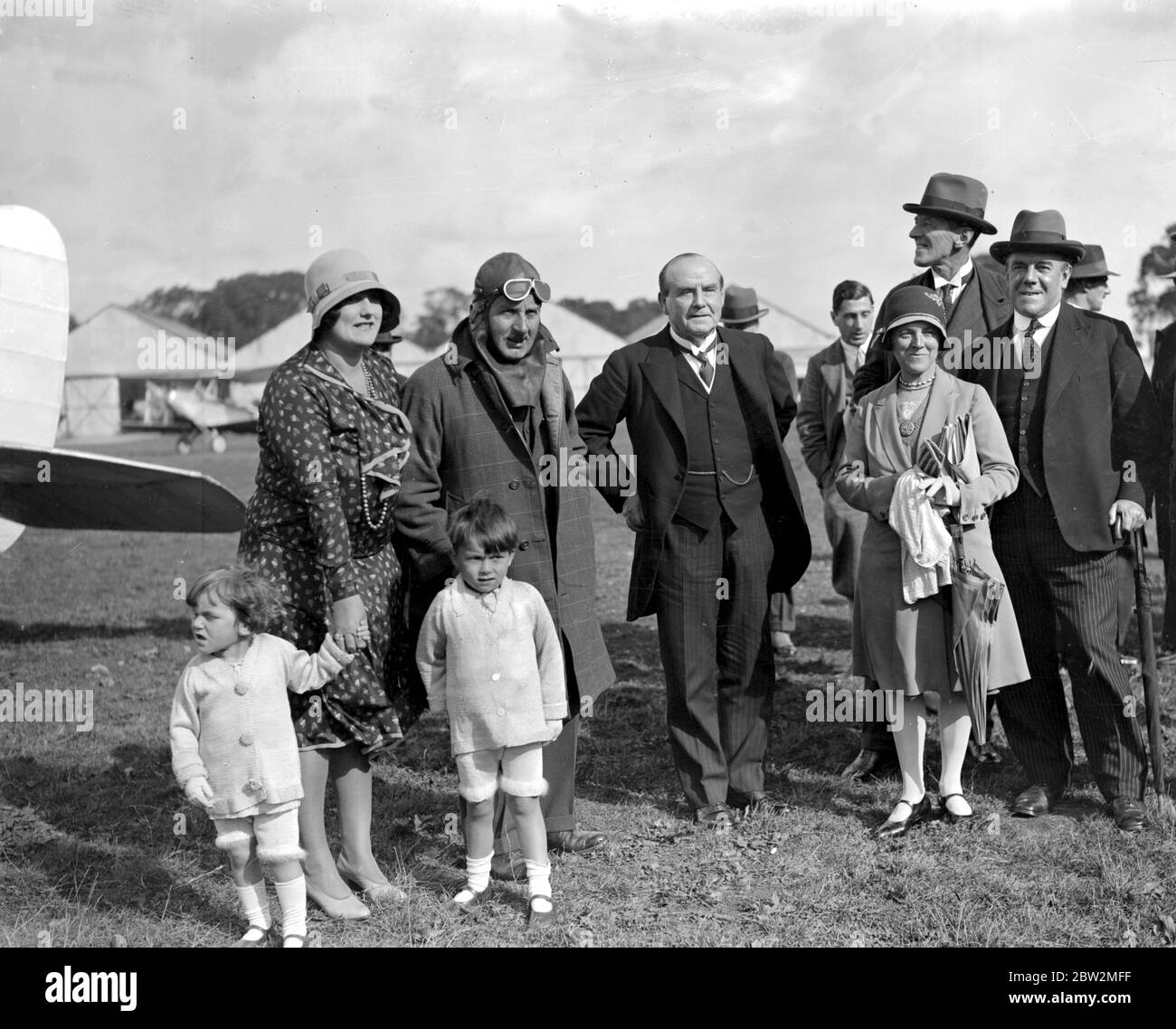 Stag Lane Aerodrome. Lady Cobham, Sir Alan Cobham, Sir Chas. (and their children). undated Stock Photo