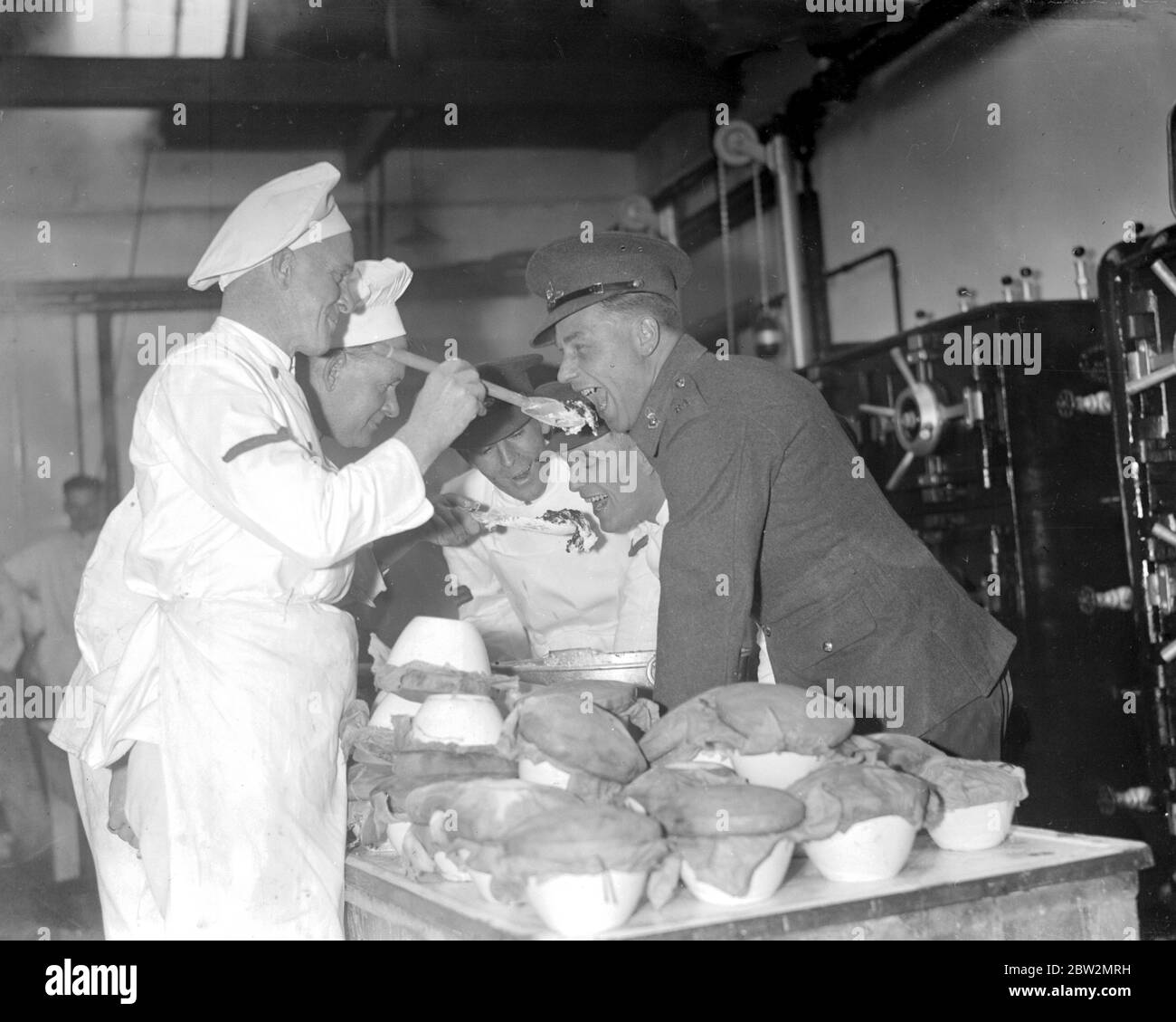 Making the christmas pudding is an enjoying task for the Royal Artillery, Woolwich. 6 December 1935 Stock Photo