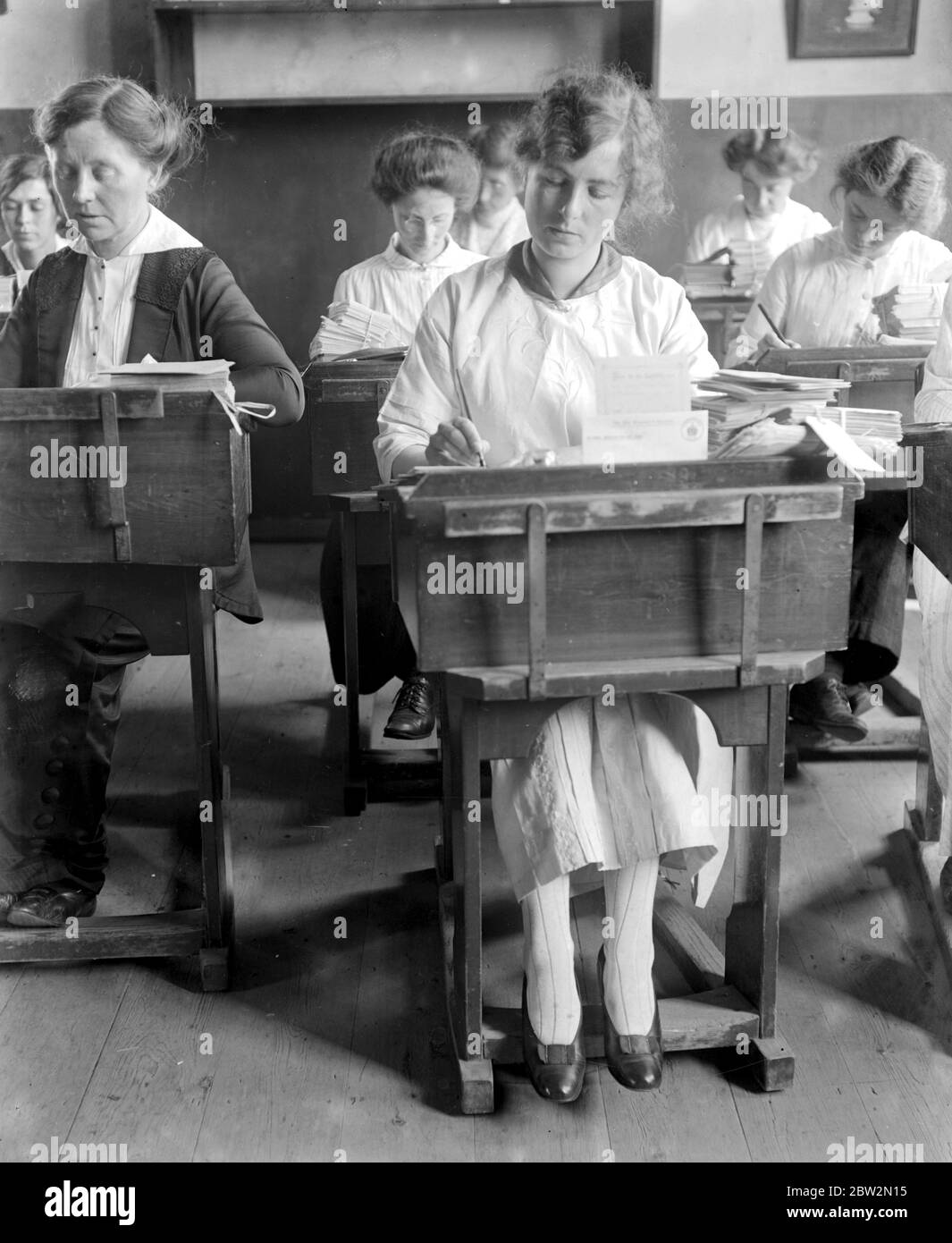 Teachers enumerating national register forms at the high school, Wimbledon. Stock Photo