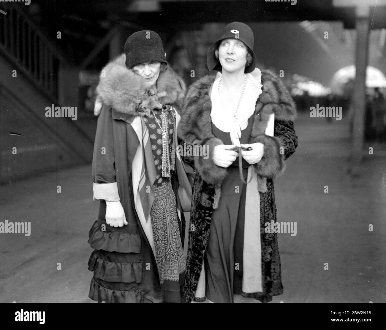 At Paddington , on her return from America. Lady Diana Cooper (right ...