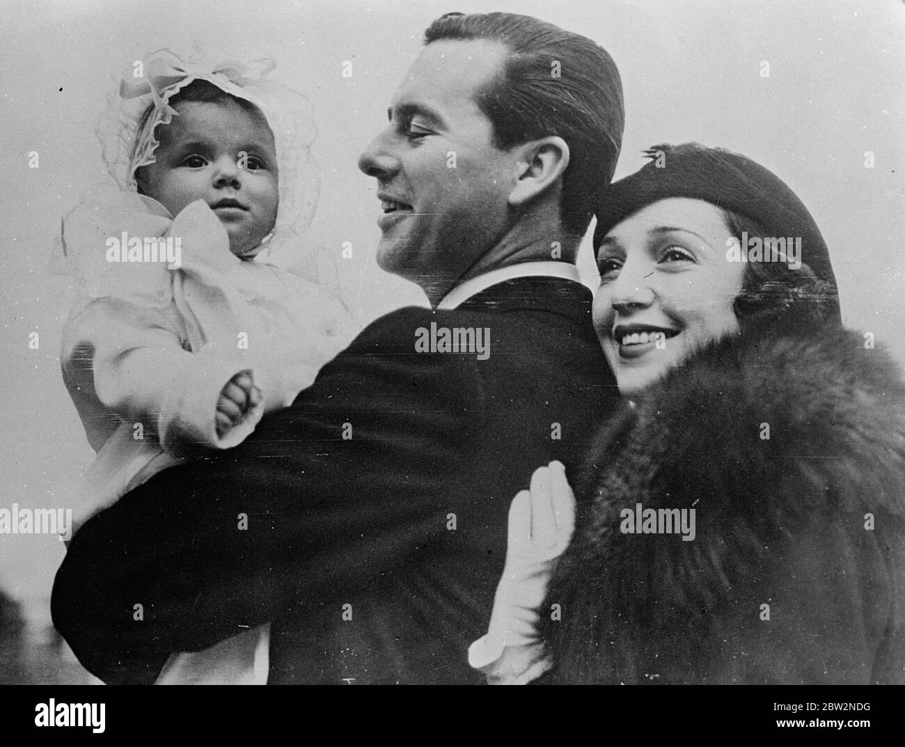 Ben Lyon and Bebe Daniels with their baby daughter . Ben Lyon and Bebe Daniels the film stars with their baby daughter Barbara Bebe Lyon , after its christening at the Hollywood Congregational church . 18 February 1932 30s, 30's, 1930s, 1930's, thirties, nineteen thirties Stock Photo