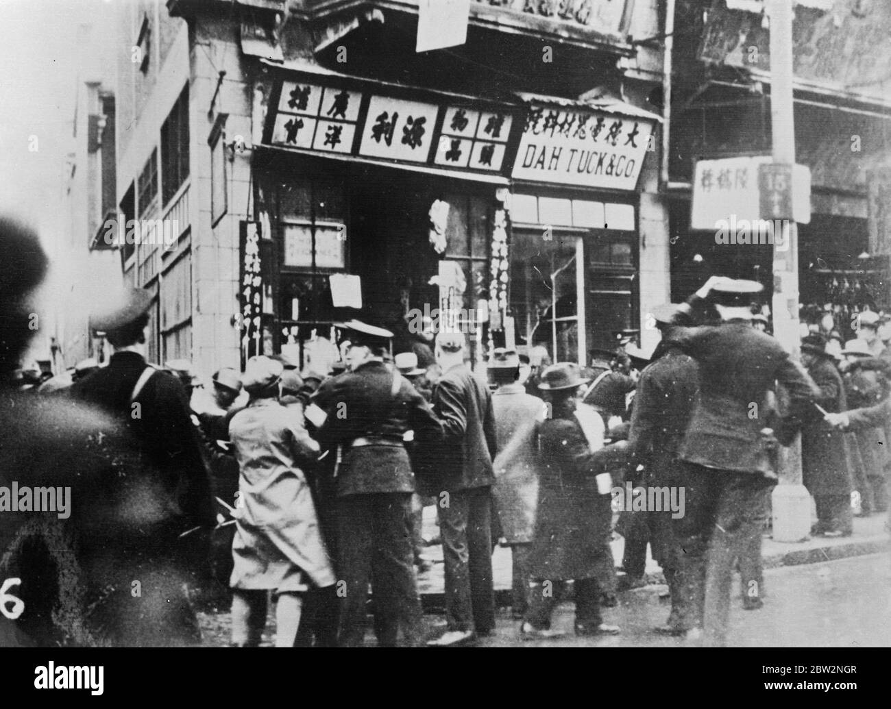 Japanese tear down Chinese boycott signs in the international settlement . The japanese feeling against the Chinese in the international settlement is particlarly bitter , especially against the Chinese campaign of boycotting japanese goods . Japanese residents in the international Settlemet tearing down Chinese Anti Japanese boycott signs .. 25 February 1932 30s, 30's, 1930s, 1930's, thirties, nineteen thirties Stock Photo