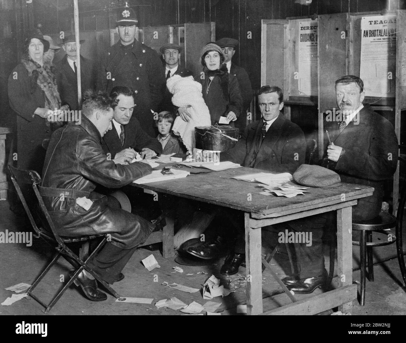 Polling in the Irish elections . Polling took place in the Irish elections . Troops were sent to a number of areas to prevent intimidation in the voting . The interior of a polling booth during the elections . 17 February 1932 30s, 30's, 1930s, 1930's, thirties, nineteen thirties Stock Photo