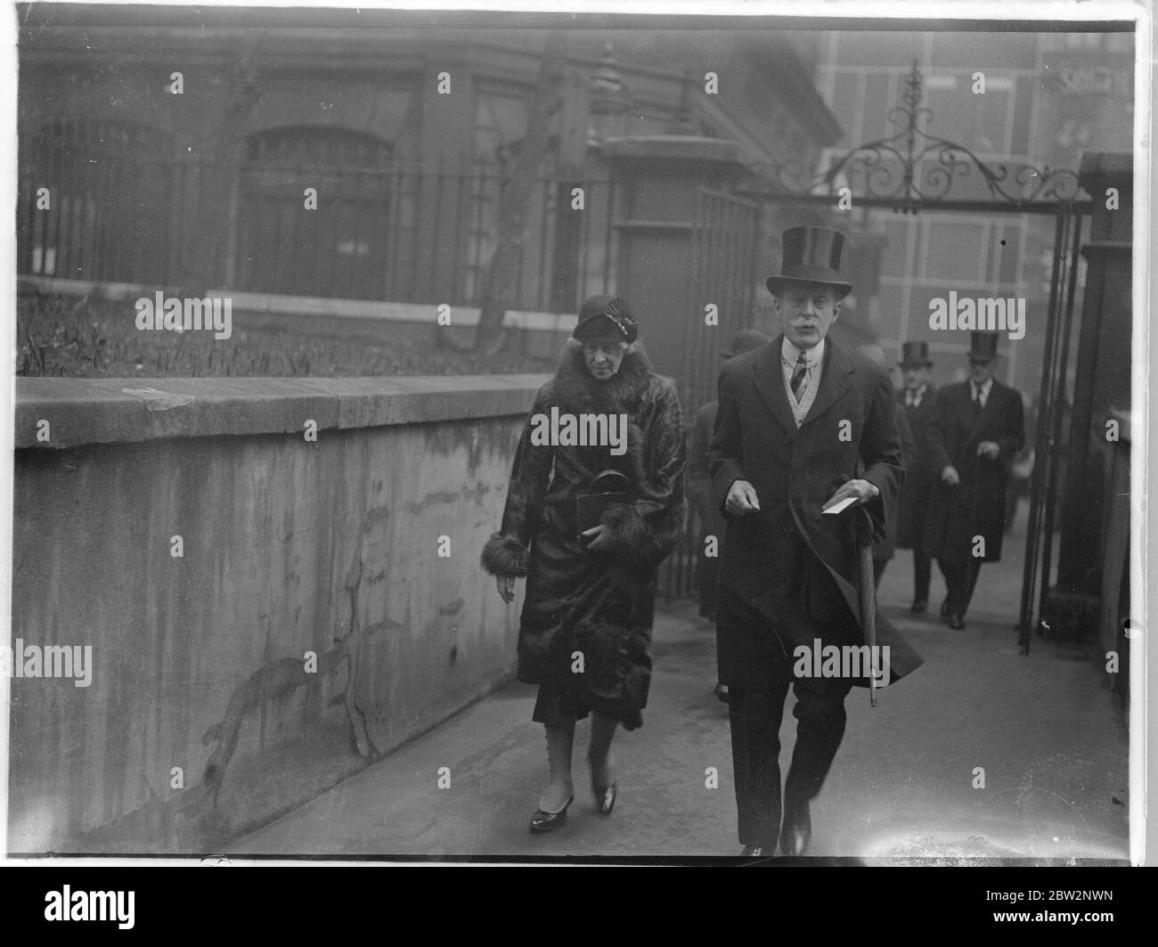 Memorial service for Mr Edgar Wallace . The memorial service for Mr Edgar Wallace the great novelist and playwright who died in Hollywood , took place at ST Brides church , Fleet Street , London . Sir Ian and Lady Hamilton leaving the church after the service . 15 February 1932 Stock Photo