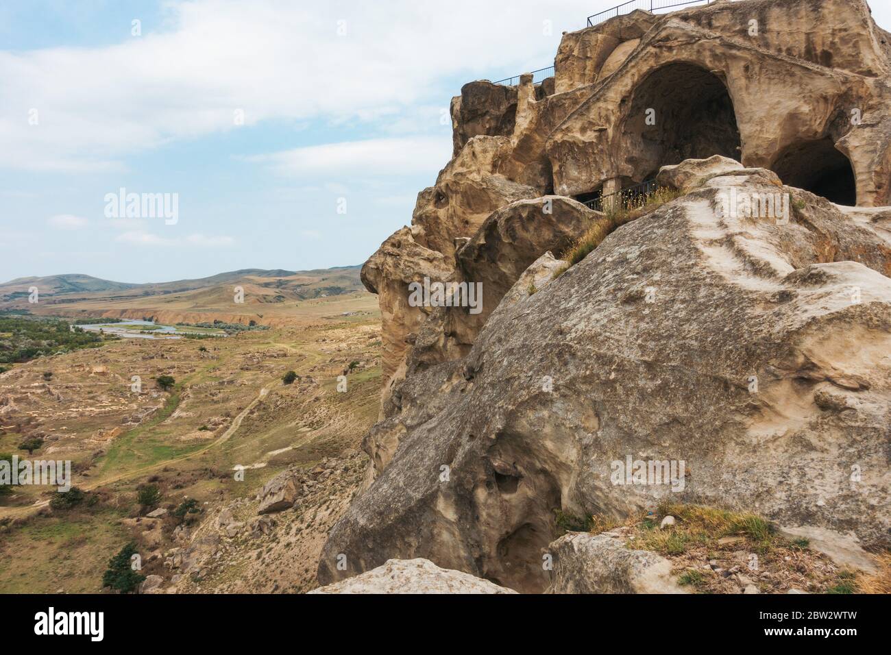 Looking to the Mtkvari River from Uplistsikhe, an ancient rock-hewn town dating back to the Iron Age, near Gori, Georgia Stock Photo