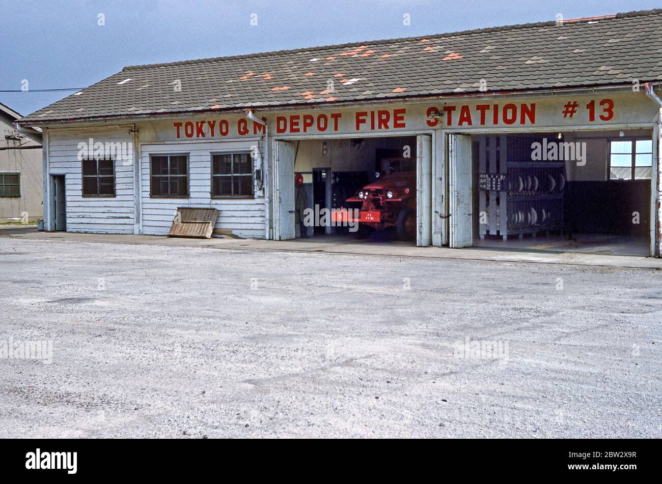 The Tokyo US Army Quartermasters Depot Fire Station No 13, Tokyo, Japan 1955. The Quartermasters Group was part of the US Army's 40th Infantry Division. The 40th Infantry Division ('Sunshine Division') is part of the US Army.  It saw active service in the Korean War (1950–53). After training in Japan, it moved to Korea in January 1952, participating in the battles of Sandbag Castle and Heartbreak Ridge. The division remained in Korea until May 1954. In 1953 their HQ moved to Tokyo, then to Yokohama and finally in October to Camp Zama, southwest of Tokyo. Stock Photo